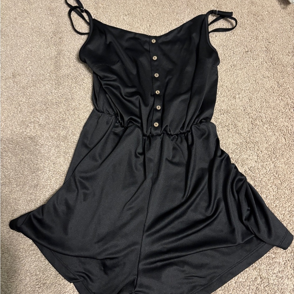 Elegant Black romper with buttons